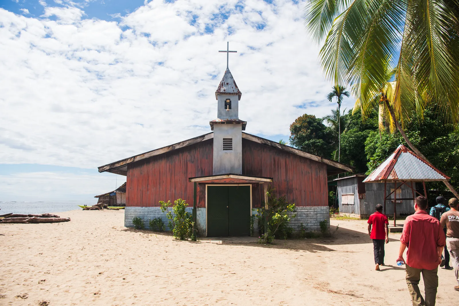 Traditional boats and coastal village — Welcome Ceremony in PNG Village