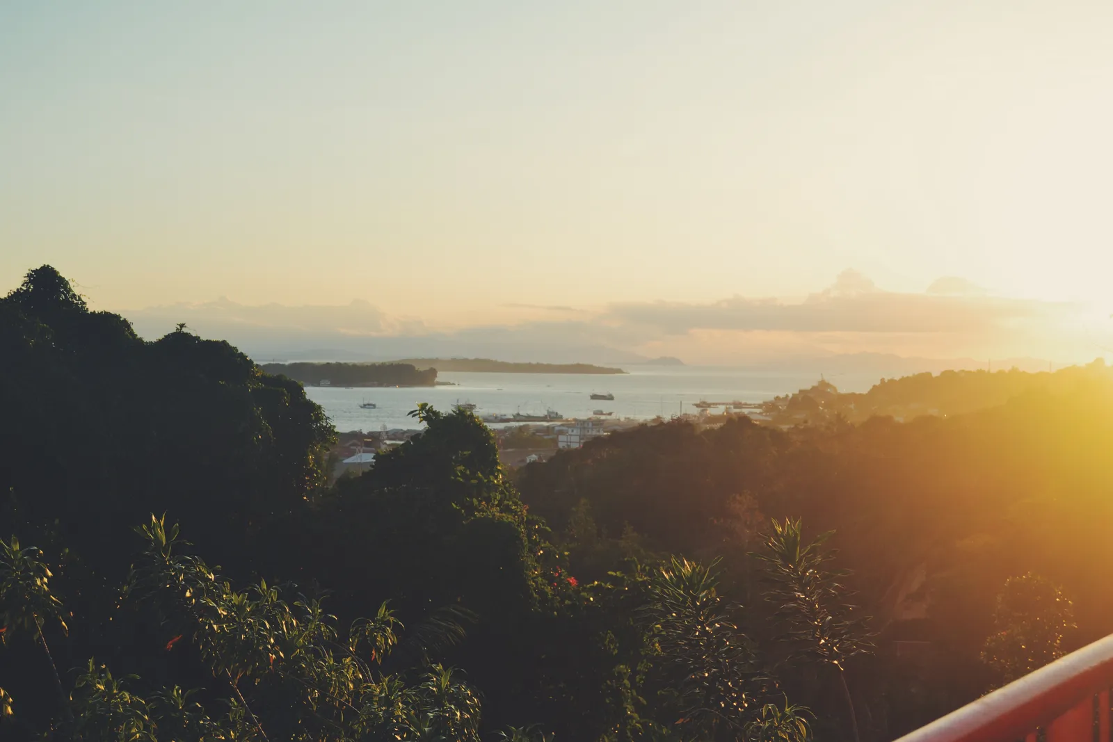 Tropical island seascape — Sunset over tropical lake (Unsplash)